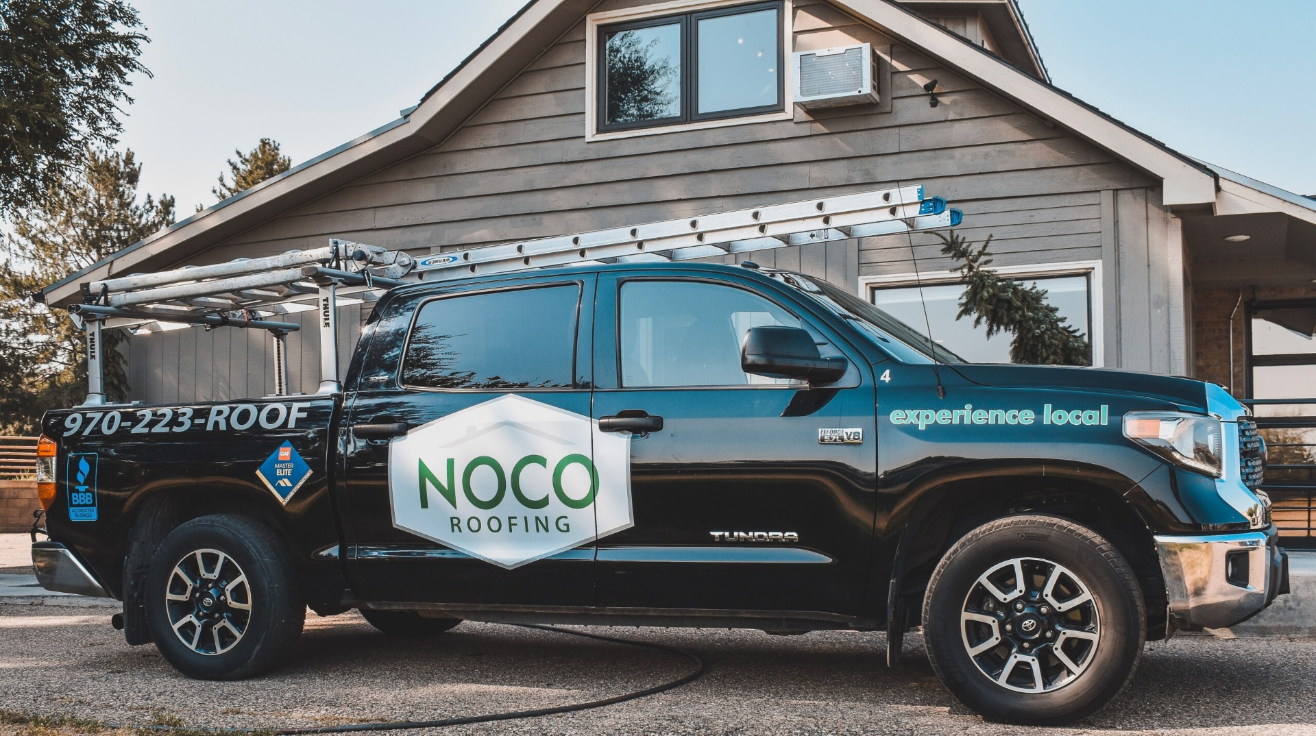 NOCO Roofing service truck
